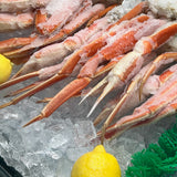 Canadian Snow Crab Legs with Lemons in Blue Water Fish's case